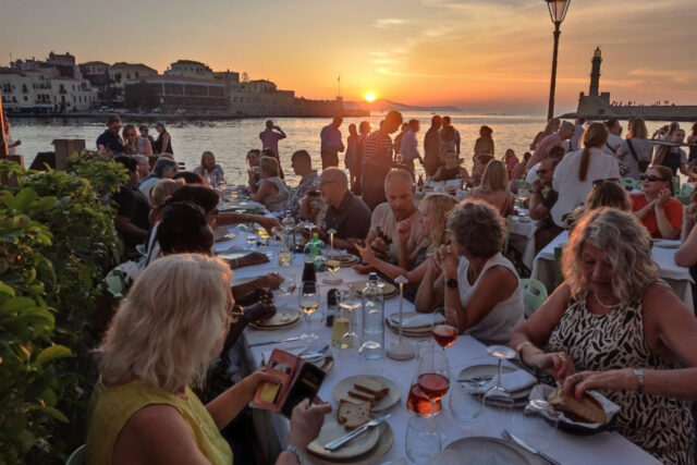 sunset-dinner-chania-old-harbour-singles-in-crete-solo-holidays-trips-greece-greek-island-mediterranean-food-make-new-friends-travel-alone