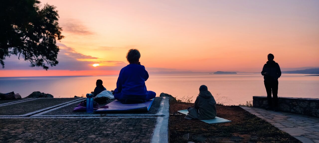 watching-the-sun-coming-out-from-the-sea-yoga-class-at-mistral-hotel-only-for-singles-holidaymakers-in-crete-greece