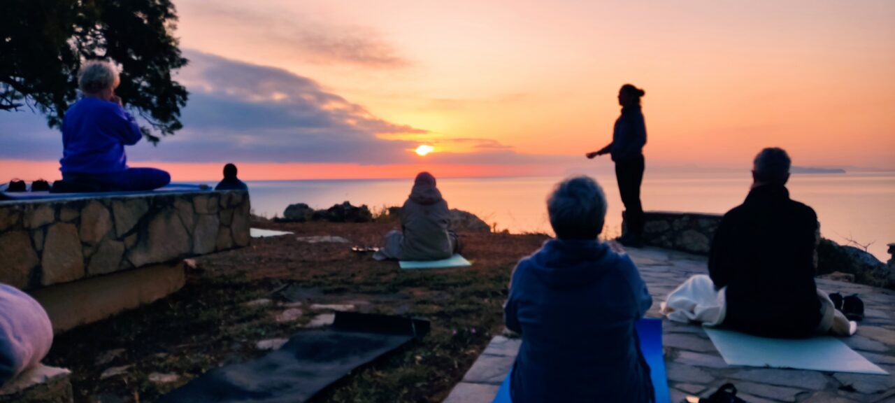 sunrise-yoga-with-group-of-solo-travellers-at-mistral-hotel-singles-only-crete-greece