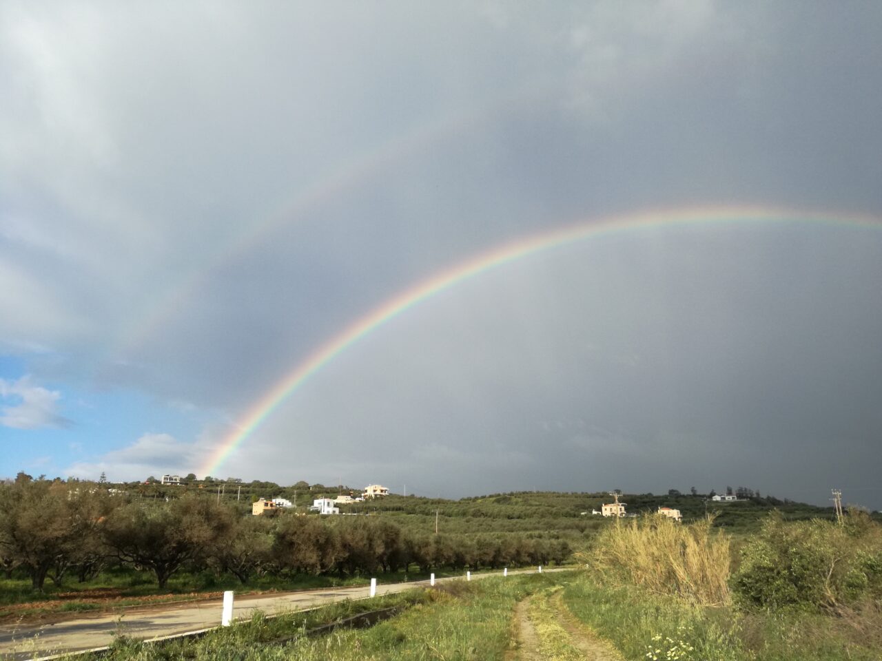 rainbow over maleme at mistral hotel for solo travellers
